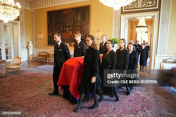 The coffin of King Harald V of Norway is moved from the Red Salon to the Palace Chapel in Oslo on August 31, 2026 by members of the royal family: The...