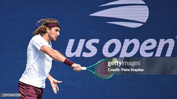 Stefanos Tsitsipas hits a backhand against Arthur Fils during a Men's Singles match on Day Two of the 2026 US Open at USTA Billie Jean King National...
