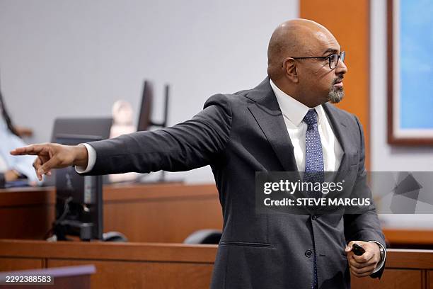 Chief Deputy District Attorney Binu Palal points to defendant Duane Davis as he gives closing arguments in the Duane Davis murder trial, related to...