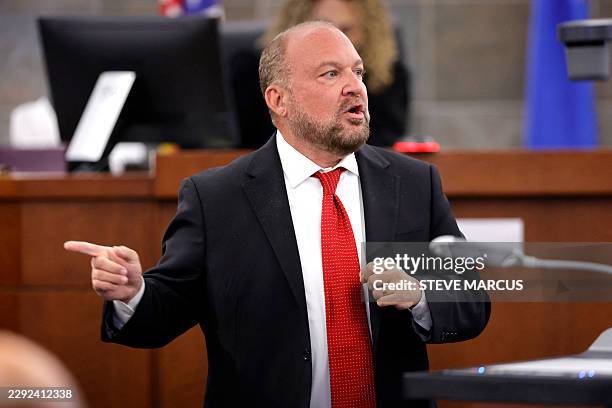 Chief Deputy District Attorney Marc DiGiacomo points to defendant Duane Davis during rebuttal closing arguments in the Duane Davis murder trial,...