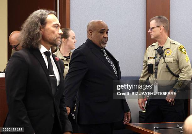 Duane Davis and his attorney Michael Sanft are led back to a courtroom to hear his sentencing date after a jury found Davis guilty in the 1996...