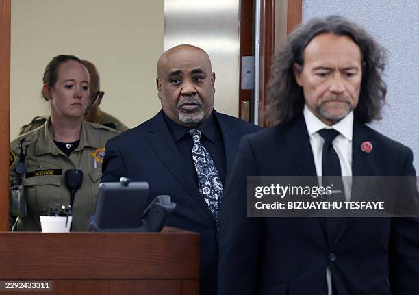 Duane Davis and his attorney Michael Sanft are led back to a courtroom to hear his sentencing date after a jury found Davis guilty in the 1996...