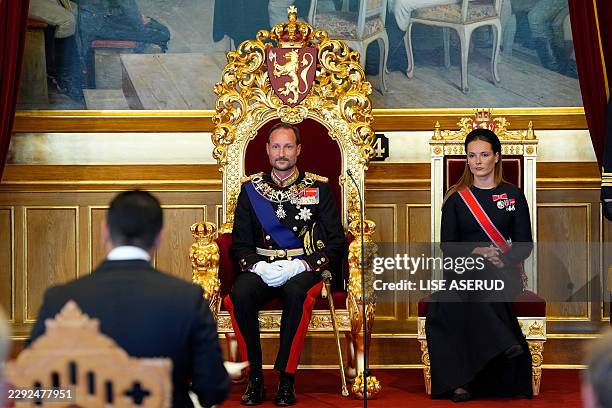 Crown Princess Ingrid Alexandra of Norway sits next to her father King Haakon VIII of Norway during an oath-taking ceremony for the new king to...