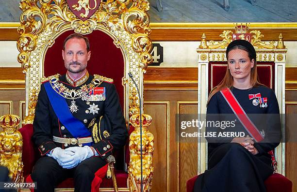 Crown Princess Ingrid Alexandra of Norway sits next to her father King Haakon VIII of Norway during an oath-taking ceremony for the new king to...