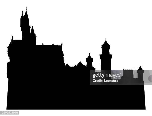 neuschwanstein castle, germany silhouette - neuschwanstein castle stock illustrations