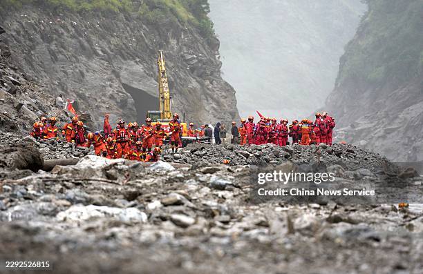 Members of the Tibet Fire and Rescue Team conduct search and rescue operations along the Gyirong Zangbo River at the Gyirong Port disaster site on...