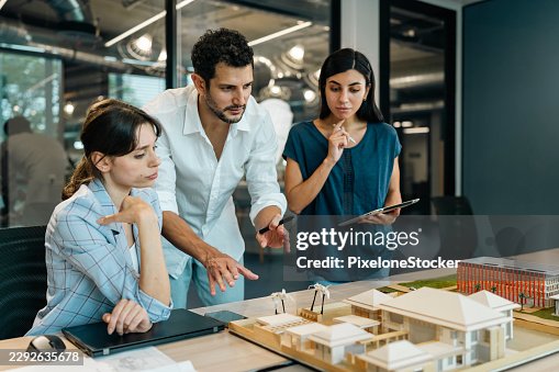 Architects team working on project plan. Architects team working on project plan.