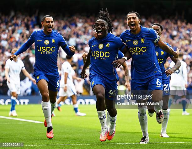 Romeo Lavia of Chelsea celebrates scoring his team’s first goal with Levi Colwill and Maxence Lacroix during the Premier League 2026/27 match between...