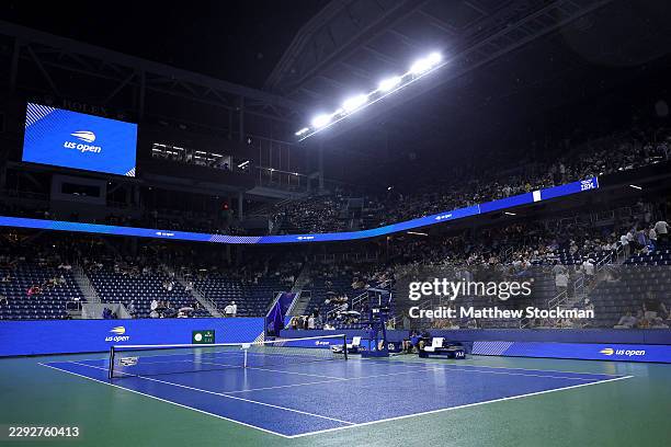 Rain falls on the court between Singles First Round matches on Day One of the 2026 US Open at USTA Billie Jean King National Tennis Center on August...