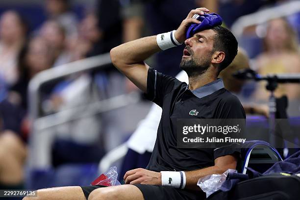 Novak Djokovic of Serbia reacts during a changeover against Mariano Navone of Argentina during their Men's Singles First Round match on Day One of...