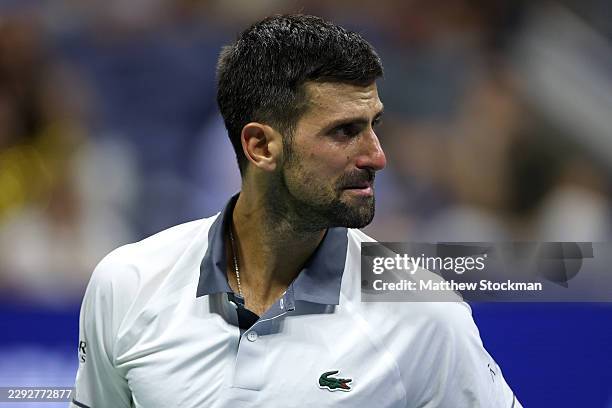 Novak Djokovic of Serbia reacts against Mariano Navone of Argentina during their Men's Singles First Round match on Day One of the 2026 US Open at...