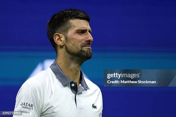 Novak Djokovic of Serbia reacts against Mariano Navone of Argentina during their Men's Singles First Round match on Day One of the 2026 US Open at...