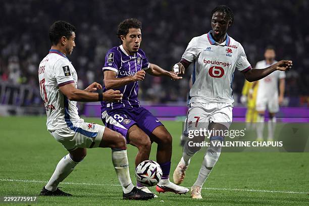 Toulouse's French midfielder Ilyas Azizi controls the ball during the French L1 football match between Toulouse Football Club and Lille LOSC at the...
