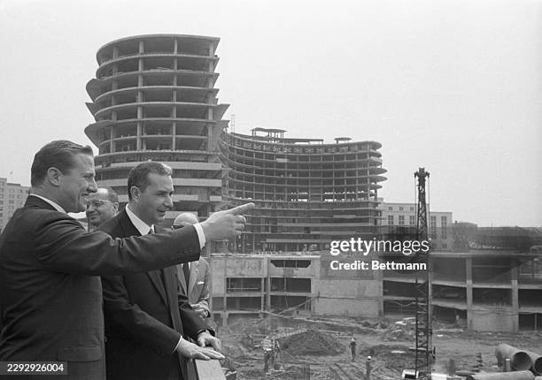 Visiting Italian Prime Minister Aldo Moro , on a sightseeing tour of the nation's capital today, inspects Watergate Town, a commercial development....