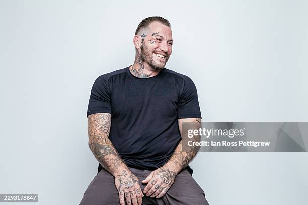 handsome heavily tattooed man - flatten the curve stock pictures, royalty-free photos & images