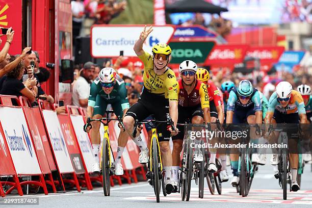Matthew Brennan of Great Britain and Team Visma | Lease a Bike celebrates at finish line as stage winner ahead of Wout Van Aert of Belgium and Team...