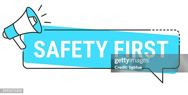 safety first - speech bubble and megaphone on white background - safety first stock illustrations