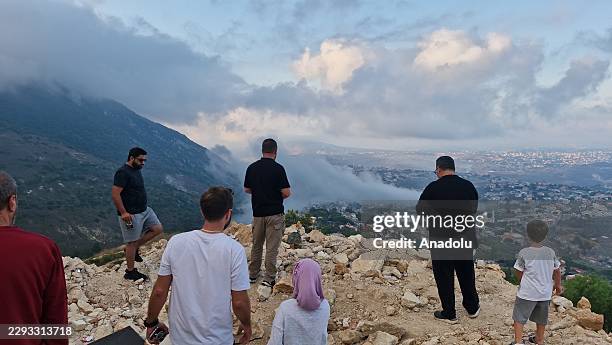 Thick smoke rise above residential structures following an Israeli airstrike in the town of Arab Salim, Nabatieh Governorate, southern Lebanon, on...