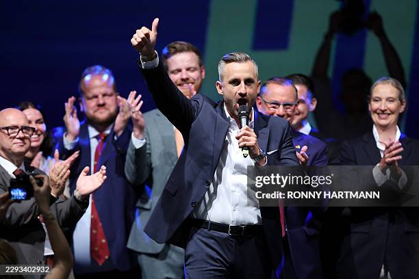 Ulrich Siegmund, far-right Alternative for Germany 's main candidate in the Saxony-Anhalt state election, gestures as he addresses supporters at the...