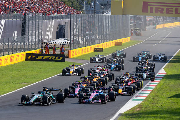 George Russell of the Mercedes-AMG PETRONAS F1 Team leads the two Alpine cars of Franco Colapinto and Pierre Gasly during the Formula One Italian...