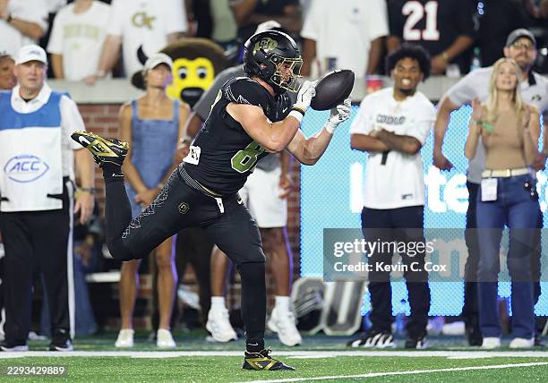 Charlie Williams of the Colorado Buffaloes pulls in this reception on the way to a game-tying touchdown against the Georgia Tech Yellow Jackets...