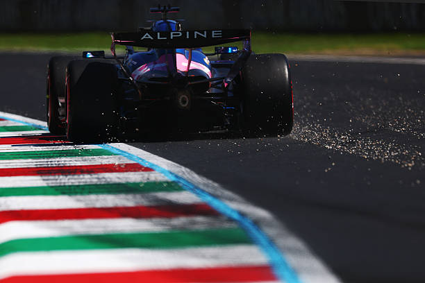 Paul Aron of Estonia driving the Alpine F1 A526 Mercedes leaves a trail of gravel on track during practice ahead of the F1 Grand Prix of Italy at...