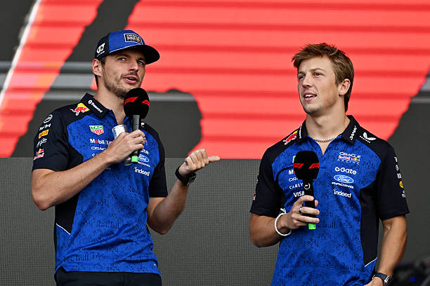 Max Verstappen of the Netherlands and Oracle Red Bull Racing and Liam Lawson of New Zealand and Oracle Red Bull Racing on stage during final practice...
