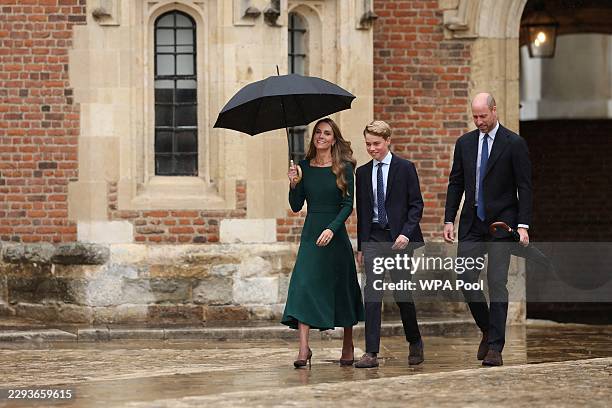 Catherine, Princess of Wales and Prince William, Prince of Wales walk with their 13-year-old son, Prince George of Wales , as he arrives for his...