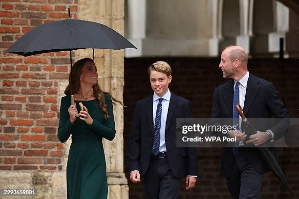 Catherine, Princess of Wales and Prince William, Prince of Wales walk with their 13-year-old son, Prince George of Wales , as he arrives for his...