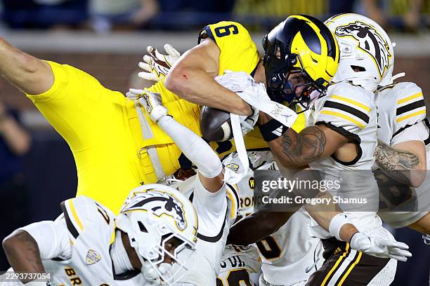 Buchanan of the Michigan Wolverines catches a game winning pass with no time left on the clock to beat the Western Michigan Broncos 13-12 at Michigan...