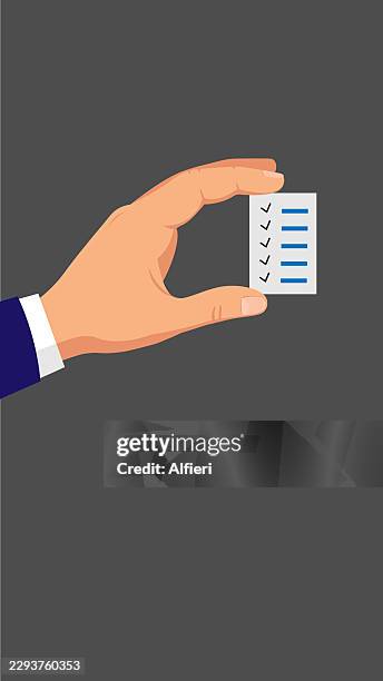 human hand holding task checklist - task management stock illustrations