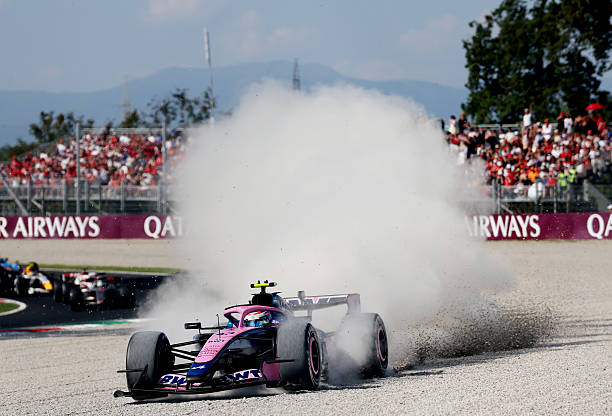 Franco Colapinto of Argentina driving the Alpine F1 A526 Mercedes runs through the gravel at the restart during the F1 Grand Prix of Italy at...