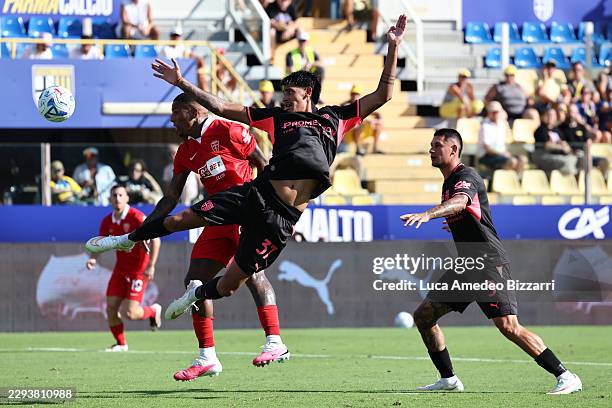 Michael Folorunsho of AC Monza competes for the ball with Mariano Emir Troilo of Parma Calcio 1913 during the Serie A match between Parma Calcio and...