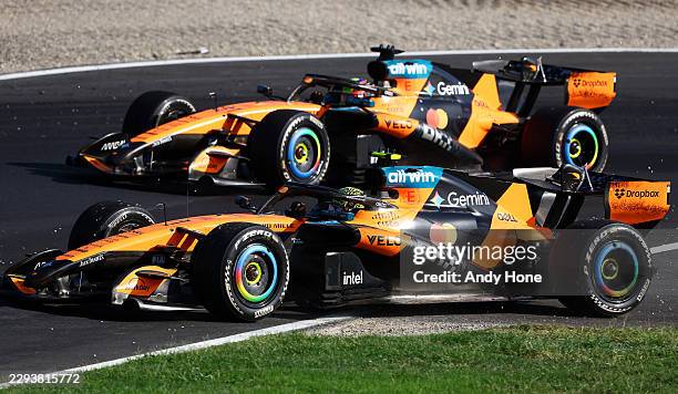Oscar Piastri of Australia driving the McLaren MCL40 Mercedes and Lando Norris of Great Britain driving the McLaren MCL40 Mercedes battle for track...