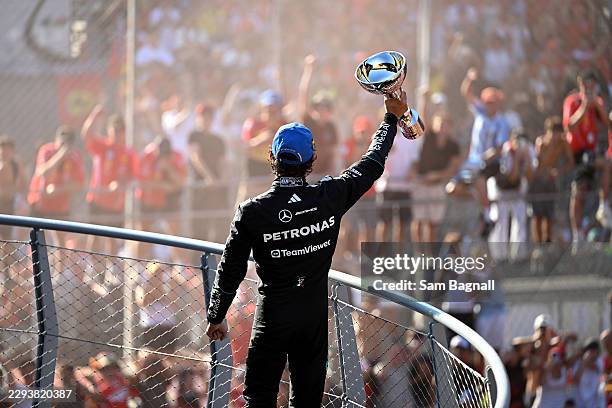 Race winner Andrea Kimi Antonelli of Italy and Mercedes AMG Petronas F1 Team lifts his trophy on the podium during the F1 Grand Prix of Italy at...