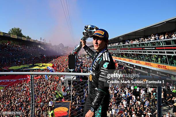 Race winner Andrea Kimi Antonelli of Italy and Mercedes AMG Petronas F1 Team on the podium with his trophy during the F1 Grand Prix of Italy at...