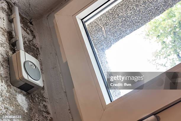 a light sensor next to a window - automatic window stock pictures, royalty-free photos & images