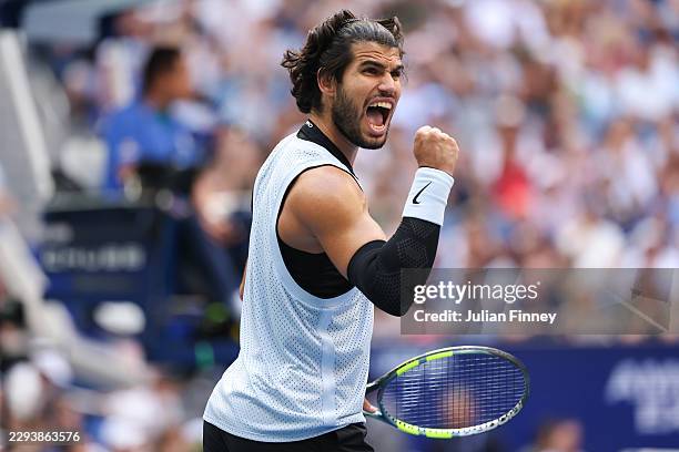Carlos Alcaraz of Spain reacts against Tommy Paul of United States during their Men's Singles Fourth Round match on Day Eight of the 2026 US Open at...
