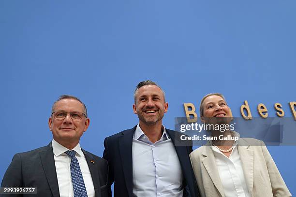 Ulrich Siegmund , lead candidate of the far-right Alternative for Germany , and AfD co-leaders Tino Chrupalla and Alice Weidel arrive to speak to the...