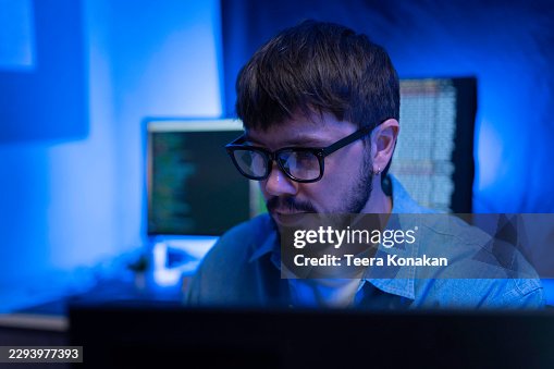 Computer Programmers Coding Cybersecurity and Data Protection Software. Computer Programmers Coding Cybersecurity and Data Protection Software.