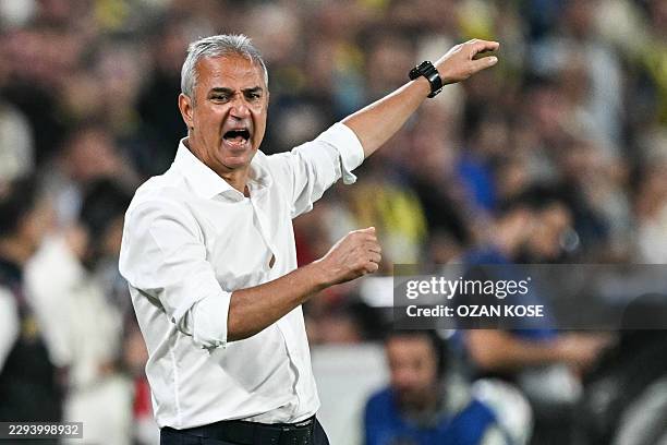 Fenerbahçe's Turkish headcoach Ismail Kartal reacts during the UEFA Champions League first round day 1 football match between Fenerbahce SK and AS...