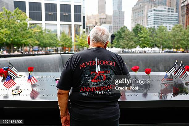 Visitor pauses at the reflecting pools to commemorate the 25th anniversary of the September 11th terrorist attacks on the World Trade Center at the...