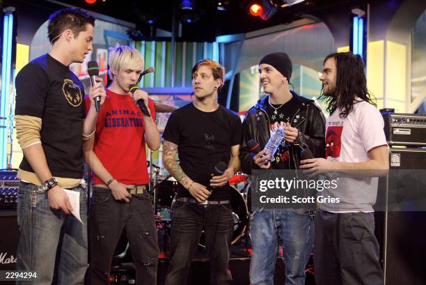 The Used with MTV VJ Damien Fahey during "Spankin' New Band Week" on TRL and MTV2 at the MTV studios in New York City. January 14, 2003. Photo by...