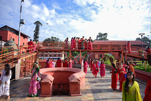Hindu women devotees gather to celebrate the Teej festival at Pashupatinath Temple in Kathmandu, Nepal, on September 14, 2026. Teej, also known as...