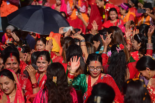 Hindu women gather to celebrate the Teej festival at Pashupatinath Temple in Kathmandu, Nepal, on September 14, 2026. Teej, also known as Hartalika...