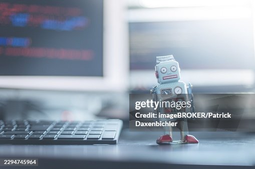 Symbol for a chatbot or social bot and algorithms, program code in the background Symbol for a chatbot or social bot and algorithms, program code in the background