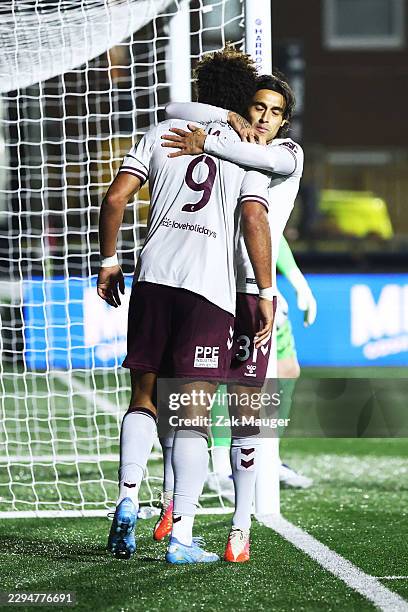 Yan Dhanda of Heart of Midlothian celebrates scoring his team's third goal with JJ Williams of Heart of Midlothian during the Premier Sports Cup...