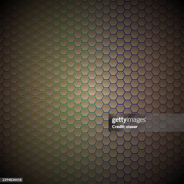a dark hexagonal grid pattern with subtle rainbow-tinted outlines and a soft center glow, fading into shadowed edges across a textured metallic-looking surface. - low key lighting stock illustrations