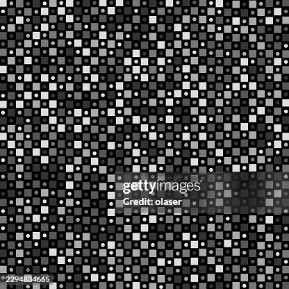 Black, gray, and white dotted grid pattern forming a dense geometric surface with repeating squares, circles, and subtle diagonal variations across the frame. Black, gray, and white dotted grid pattern forming a dense geometric surface with repeating squares, circles, and subtle diagonal variations across the frame.
