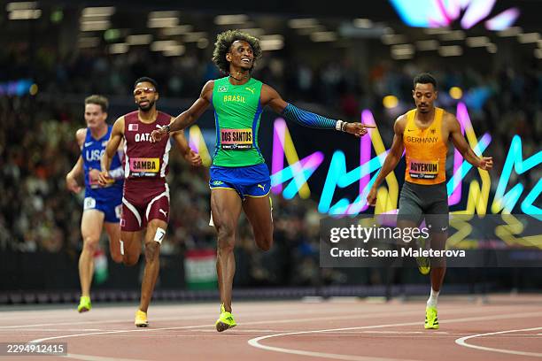 Alison Dos Santos of Team Brazil reacts as he crosses the finish line in the Men's 400 Metres Hurdles Semi-Finals during Day 2 of the World Athletics...